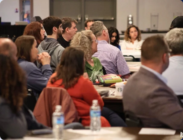 A seated audience listening at the Berrien Connection kickoff celebration
